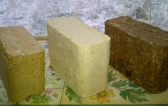 Three wood blocks RUF briquettes made with different wood types - Wood Fuel Co-operative