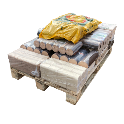 A pallet with a mixture of wood briquette heat logs on it - Wood Fuel Co-operative